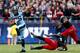 CHARLOTTE, NC - DECEMBER 28: Eric Ebron #85 of the North Carolina Tar Heels makes a catch against Solomon Tentman #33 of the Cincinnati Bearcats during their game at Bank of America Stadium on December 28, 2013 in Charlotte, North Carolina. (Photo by St