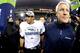 SEATTLE, WA - JANUARY 19: Quarterback Russell Wilson #3 and head coach Pete Carroll of the Seattle Seahawks celebrate after the Seahawks 23-17 victory against the San Francisco 49ers during the 2014 NFC Championship at CenturyLink Field on January 19, 20