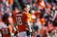 DENVER, CO - JANUARY 19: Peyton Manning #18 of the Denver Broncos looks on during warm-ups prior to their AFC Championship game against the New England Patriots at Sports Authority Field at Mile High on January 19, 2014 in Denver, Colorado. (Photo by Ke