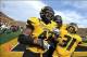 October 27, 2012; Columbia, MO, USA; Missouri Tigers defensive lineman Kony Ealy (47) and Missouri Tigers defensive back E.J. Gaines (31) celebrate after scoring a touchdown on a fumble during the fourth quarter at Faurot Field. The Missouri Tigers defeat