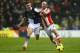 STOKE ON TRENT, ENGLAND - JANUARY 12: Jordan Henderson of Liverpool battles with Stephen Ireland of Stoke City during the Barclays Premier League match between Stoke City and Liverpool at Britannia Stadium on January 12, 2014 in Stoke on Trent, England.