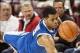 Jan 14, 2014; Fayetteville, AR, USA; Kentucky Wildcats guard Andrew Harrison (5) and Arkansas Razorbacks guard Kikko Haydar (20) scramble for a loose ball during a game at Bud Walton Arena. Arkansas defeated Kentucky 87-85 in overtime. Mandatory Credit: B