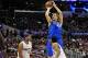 January 15, 2014; Los Angeles, CA, USA; Dallas Mavericks power forward Dirk Nowitzki (41) attempts a three point basket against the Los Angeles Clippers during the first half at Staples Center. Mandatory Credit: Gary A. Vasquez-USA TODAY Sports