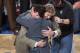 DALLAS, TX - JANUARY 25: Dirk Nowitzki #41 of the Dallas Mavericks shares a hug with team owner Mark Cuban as the Mavericks received their 2010-2011 NBA Championship rings prior to a game against the Minnesota Timberwolves on January 25, 2012 at the Ameri