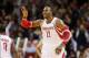 Jan 18, 2014; Houston, TX, USA; Houston Rockets center Dwight Howard (12) celebrates a three point shot during the second half against the Milwaukee Bucks at Toyota Center. The Rockets won 114-104. Mandatory Credit: Soobum Im-USA TODAY Sports