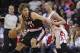 Jan 20, 2014; Houston, TX, USA; Portland Trail Blazers center Robin Lopez (42) controls the ball during the second quarter as Houston Rockets small forward Chandler Parsons (25) defends at Toyota Center. Mandatory Credit: Troy Taormina-USA TODAY Sports