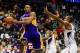 Dec 16, 2013; Atlanta, GA, USA; Los Angeles Lakers shooting guard Kobe Bryant (24) tries to keep the ball in bounds in the first quarter against the Atlanta Hawks at Philips Arena. Mandatory Credit: Daniel Shirey-USA TODAY Sports