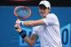 MELBOURNE, AUSTRALIA - JANUARY 20: Andy Murray of Great Britain plays a backhand in his fourth round match against Stephane Robert of France during day eight of the 2014 Australian Open at Melbourne Park on January 20, 2014 in Melbourne, Australia. (Pho