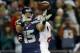 SEATTLE, WA - JANUARY 19: Wide receiver Jermaine Kearse #15 of the Seattle Seahawks catches a fourth quarter touchdown against cornerback Carlos Rogers #22 of the San Francisco 49ers during the 2014 NFC Championship at CenturyLink Field on January 19, 20
