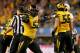 ARLINGTON, TX - JANUARY 03: Michael Sam #52 of the Missouri Tigers reacts after Ben Grogan #19 of the Oklahoma State Cowboys misses a 34-yard field goal in the second quarter during the AT&T Cotton Bowl on January 3, 2014 in Arlington, Texas. (Photo by
