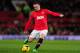 MANCHESTER, ENGLAND - DECEMBER 21: Wayne Rooney of Manchester United in action during the Barclays Premier League match between Manchester United and West Ham United at Old Trafford on December 21, 2013 in Manchester, England. (Photo by Stu Forster/Gett