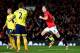 MANCHESTER, ENGLAND - JANUARY 22: Jonny Evans of Manchester United celebrates after scoring the opening goal during the Capital One Cup semi final, second leg match between Manchester United and Sunderland at Old Trafford on January 22, 2014 in Mancheste