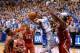 DURHAM, NC - JANUARY 18: Quinn Cook #2 of the Duke Blue Devils drives against Beejay Anya #21 of the North Carolina State Wolfpack during their game at Cameron Indoor Stadium on January 18, 2014 in Durham, North Carolina. Duke won 95-60. (Photo by Grant