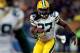 CHICAGO, IL - DECEMBER 29: Running back Eddie Lacy #27 of the Green Bay Packers carries the ball against the Chicago Bears during a game at Soldier Field on December 29, 2013 in Chicago, Illinois. (Photo by Jonathan Daniel/Getty Images)