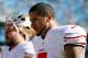 CHARLOTTE, NC - JANUARY 12: Colin Kaepernick #7 of the San Francisco 49ers walks on the field during warm ups prior to the NFC Divisional Playoff Game against the Carolina Panthers at Bank of America Stadium on January 12, 2014 in Charlotte, North Carolin