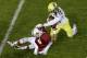 PALO ALTO, CA - NOVEMBER 07: Cornerback Ifo Ekpre-Olomu #14 of the Oregon Ducks intercepts a pass to wide receiver Michael Rector #3 of the Stanford Cardinal but is called for passing interference in the first half at Stanford Stadium on November 7, 2013