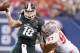 INDIANAPOLIS, IN - DECEMBER 07: Joey Bosa #97 of the Ohio State Buckeyes drags down Connor Cook #18 of the Michigan State Spartans in the third quarter during the Big 10 Conference Championship Game at Lucas Oil Stadium on December 7, 2013 in Indianapolis