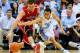 CHAPEL HILL, NC - DECEMBER 21: Tom Droney #23 of the Davidson Wildcats battles for a loose ball with Marcus Paige #5 of the North Carolina Tar Heels during a game at the Dean Smith Center on December 21, 2013 in Chapel Hill, North Carolina. North Carolin