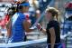 TORONTO, ON - AUGUST 09: Na Li of China greets Dominika Cibulkova of Solvakia after winning 7-6 (1), 6-2 at the Rogers Cup Toronto on day 5 at Rexall Centre at York University on August 9, 2013 in Toronto, Canada. (Photo by Andy Lyons/Getty Images)