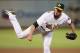 OAKLAND, CA - SEPTEMBER 6: Closing pitcher Grant Balfour #50 of the Oakland Athletics follows through on a pitch against the Houston Astros in the ninth inning at O.co Coliseum on September 6, 2013 in Oakland, California. The A's won 7-5. (Photo by Bri