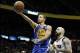 Jan 3, 2014; Atlanta, GA, USA; Golden State Warriors point guard Stephen Curry (30) shoots the ball against the Atlanta Hawks in the second quarter at Philips Arena. Mandatory Credit: Brett Davis-USA TODAY Sports