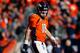 DENVER, CO - JANUARY 19: Peyton Manning #18 of the Denver Broncos looks on against the New England Patriots during the AFC Championship game at Sports Authority Field at Mile High on January 19, 2014 in Denver, Colorado. (Photo by Kevin C. Cox/Getty Ima
