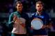 MADRID, SPAIN - MAY 12: Rafael Nadal (L) of Spain stands with runner up Stanislas Wawrinka of Switzerland holding their trophies after Nadal won the final on day nine of the Mutua Madrid Open tennis tournament at the Caja Magica on May 12, 2013 in Madri