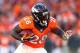 DENVER, CO - JANUARY 19: Montee Ball #28 of the Denver Broncos runs with the ball against the New England Patriots during the AFC Championship game at Sports Authority Field at Mile High on January 19, 2014 in Denver, Colorado. (Photo by Elsa/Getty Imag