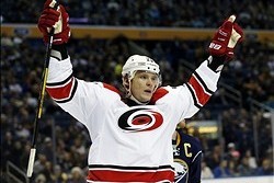 Jan 23, 2014; Buffalo, NY, USA; Carolina Hurricanes right wing Alexander Semin (28) celebrates after scoring his second goal of the night against the Buffalo Sabres during the third period at First Niagara Center. Hurricanes beat the Sabres 5-3. Mandatory