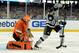 LOS ANGELES, CA - JANUARY 25: Jeff Carter #77 of the Los Angeles Kings tries to jam the puck home against Jonas Hiller #1 of the Anaheim Ducks during the 2014 Coors Light NHL Stadium Series at Dodger Stadium on January 25, 2014 in Los Angeles, California
