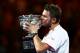 MELBOURNE, AUSTRALIA - JANUARY 26: Stanislas Wawrinka of Switzerland kisses the Norman Brookes Challenge Cup after winning his men's final match against Rafael Nadal of Spain during day 14 of the 2014 Australian Open at Melbourne Park on January 26, 2014