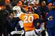 DENVER, CO - JANUARY 12: Keenan Allen #13 of the San Diego Chargers completes a first down reception against the defense of Mike Adams #20 of the Denver Broncos during the AFC Divisional Playoff Game at Sports Authority Field at Mile High on January 12,