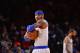 NEW YORK - JANUARY 24: Carmelo Anthony #7 of the New York Knicks looks on during the game against the Charlotte Bobcats on January 24, 2014 at Madison Square Garden in New York City. NOTE TO USER: User expressly acknowledges and agrees that, by downloadin