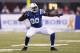INDIANAPOLIS, IN - NOVEMBER 04: Robert Mathis #98 of the Indianapolis Colts celebrates after a sack against the Miami Dolphins during the game at Lucas Oil Stadium on November 4, 2012 in Indianapolis, Indiana. (Photo by Joe Robbins/Getty Images)