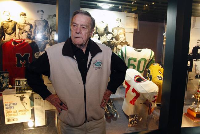 Larry Grantham with his No. 60 Jets jersey at the Mississippi Sports Hall of Fame.