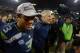 Jan 19, 2014; Seattle, WA, USA; Seattle Seahawks quarterback Russell Wilson (3) leaves the field with head coach Pete Carroll (right) after the 2013 NFC Championship football game against the San Francisco 49ers at CenturyLink Field. Mandatory Credit: Kir
