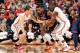 COLUMBUS, OH - MARCH 10: Aaron Craft #4 of the Ohio State Buckeyes and Shannon Scott #3 of the Ohio State Buckeyes apply pressure to Tracy Abrams #13 of the Illinois Fighting Illini forcing a turnover in the first half on March 10, 2013 at Value City Are