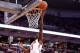 COLUMBUS, OH - JANUARY 23: Shannon Scott #3 of the Ohio State Buckeyes gets past Malcolm Hill #21 of the Illinois Fighting Illini to score a basket during the second half at Value City Arena on January 23, 2014 in Columbus, Ohio. Ohio State defeated Illi