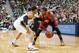 SALT LAKE CITY, UT - JANUARY 10: Kyrie Irving #2 of the Cleveland Cavaliers drives against Trey Burke #3 of the Utah Jazz at EnergySolutions Arena on January 10, 2014 in Salt Lake City, Utah. NOTE TO USER: User expressly acknowledges and agrees that, by d