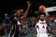 ATLANTA, GA - JANUARY 08: Paul Millsap #4 of the Atlanta Hawks against Roy Hibbert #55 of the Indiana Pacers at Philips Arena on January 8, 2014 in Atlanta, Georgia. NOTE TO USER: User expressly acknowledges and agrees that, by downloading and or using