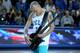 LOS ANGELES, CA - JANUARY 09: Bassist Flea of the Red Hot Chili Peppers performs the national anthem before the game between the Arizona Wildcats and the UCLA Bruins at Pauley Pavilion on January 9, 2014 in Los Angeles, California. (Photo by Stephen Dun