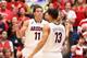 TUCSON, AZ - JANUARY 26: Aaron Gordon #11 of the Arizona Wildcats high fives Nick Johnson #13 after scoring against the Utah Utes during the college basketball game at McKale Center on January 26, 2014 in Tucson, Arizona. The Wildcats defeated the Utes 6