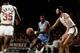 MILWAUKEE - 1975: Bob McAdoo #11 of the of the Buffalo Braves drives to the basket against Kareem Abdul-Jabbar #33 of the Milwaukee Bucks during the 1975 season at the MECCA Arena in Milwaukee, Wisconsin. NOTE TO USER: User expressly acknowledges that, b