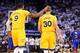 Dec 25, 2013; Oakland, CA, USA; Golden State Warriors small forward Andre Iguodala (9) celebrates with point guard Stephen Curry (30) after drawing a charge for an offensive foul against Los Angeles Clippers point guard Chris Paul (3) during the second qu