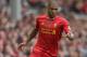 LIVERPOOL, ENGLAND - AUGUST 17: Glen Johnson of Liverpool in action during the Barclays Premier League match between Liverpool and Stoke City at Anfield on August 17, 2013 in Liverpool, England. (Photo by Clive Brunskill/Getty Images)