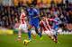 STOKE ON TRENT, ENGLAND - DECEMBER 07: John Obi Mikel of Chelsea goes past Geoff Cameron of Stoke during the Barclays Premier League match between Stoke City and Chelsea at Britannia Stadium on December 7, 2013 in Stoke on Trent, England. (Photo by Mich