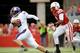 LINCOLN, NE - NOVEMBER 05: Quarterback Kain Colter #2 of the Northwestern Wildcats runs past safety Daimion Stafford #3 of the Nebraska Cornhuskers during their game at Memorial Stadium November 5, 2011 in Lincoln, Nebraska. Northwestern beat Nebraska 28