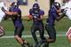 EVANSTON, IL - SEPTEMBER 29: Kain Colter #2 of the Northwestern Wildcats runs between blockers Dan Vitale #40 (L) and Demetrius Fields #8 on his way to his fourth touchdown of the game against the Indiana Hoosiers at Ryan Field on September 29, 2012 in E