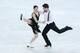 SOCHI, RUSSIA - FEBRUARY 08: Tessa Virtue and Scott Moir of Canada compete in the Figure Skating Team Ice Dance - Short Dance during day one of the Sochi 2014 Winter Olympics at Iceberg Skating Palace on February 8, 2014 in Sochi, Russia. (Photo by Matt