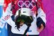 SOCHI, RUSSIA - FEBRUARY 09: Jenny Jones of Great Britain holds the cracked helmet of Sarka Pancochova of Czech Republic after Pancochova fell in the Women's Snowboard Slopestyle Finals during day two of the Sochi 2014 Winter Olympics at Rosa Khutor Extr
